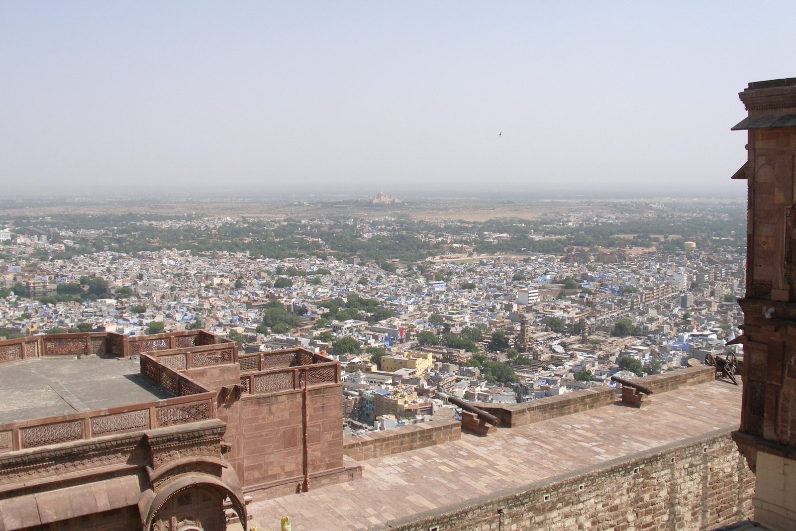 Blue houses in Jodhpur beneath Mehrangarh